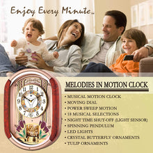 Load image into Gallery viewer, Musical Motion Wall Clock | Melodies and Rhythm Moving Face | Color: Woodgrain and Gold with Crystal | Sound and Movement | LED Lights | Tulips and Butterflies | Music: Classic, Christmas, Theraputic
